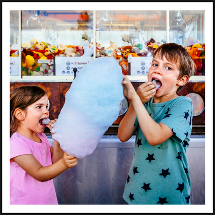 Party & Event RentalsA boy and a girl sharing cotton candy